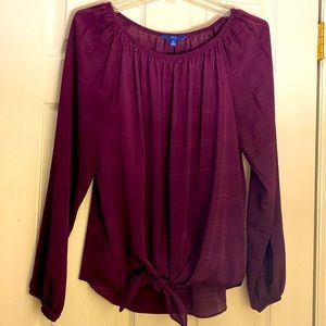 Scoop-neck blouse with tie at the bottom. Deep wine color. Gathered wrists.